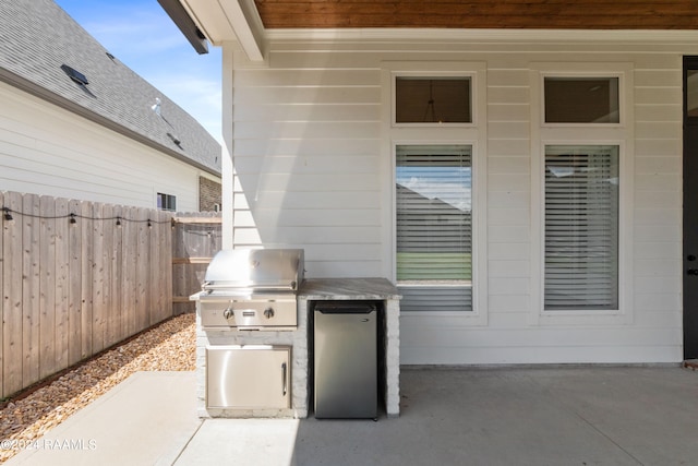 view of patio with a grill