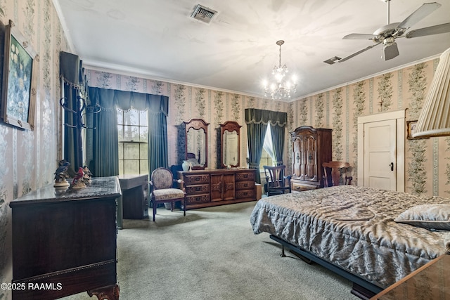 bedroom featuring crown molding, carpet floors, and ceiling fan with notable chandelier