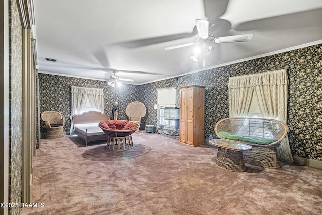 bedroom with multiple windows, crown molding, and carpet