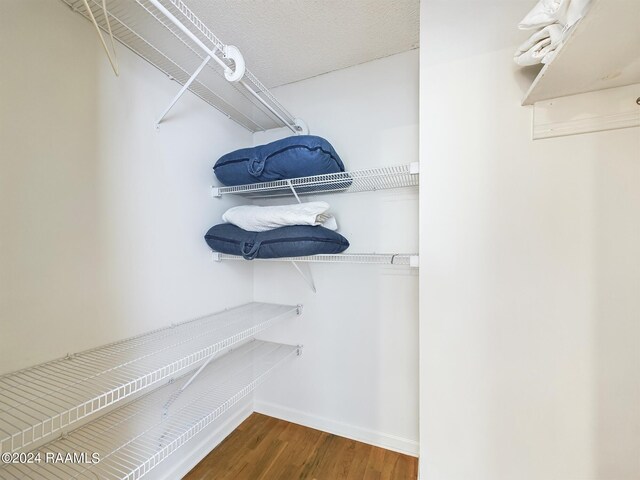 68335 Taulla Dr, Covington, LA 70433 - spacious closet featuring wood finished floors