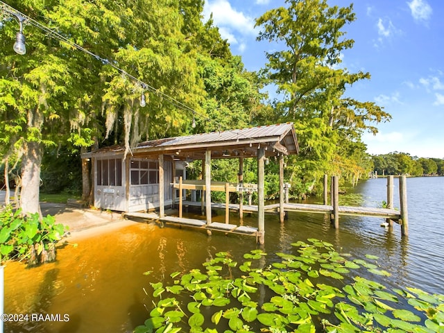 dock area featuring a water view