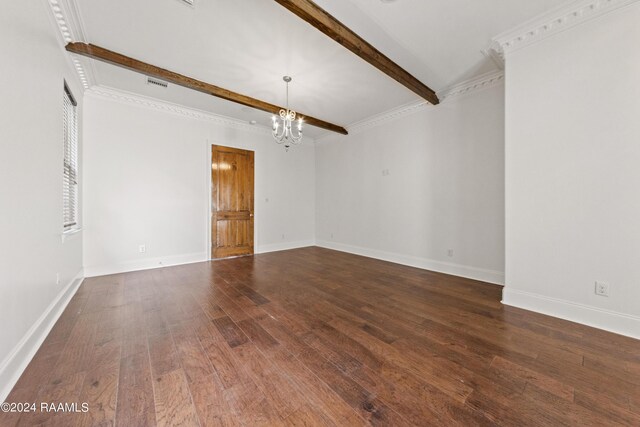 spare room featuring wood-type flooring, crown molding, beam ceiling, and a notable chandelier