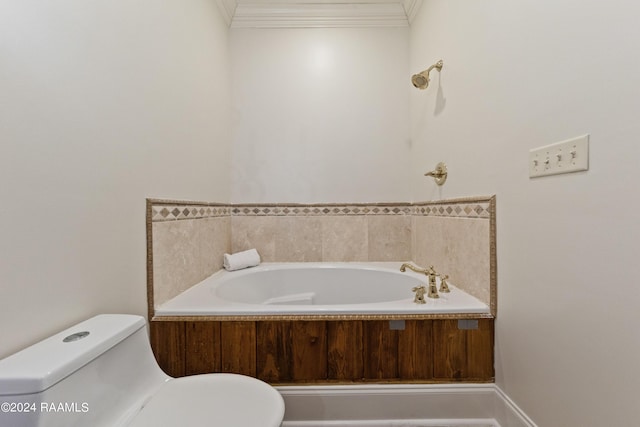 full bathroom featuring crown molding, toilet, and a bath