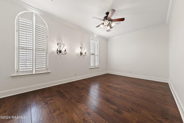 unfurnished room featuring ornamental molding, dark wood-type flooring, and ceiling fan