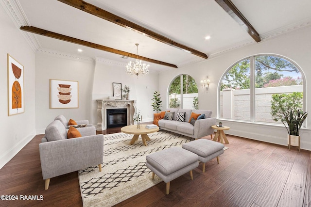 living area with a glass covered fireplace, baseboards, beam ceiling, and wood finished floors