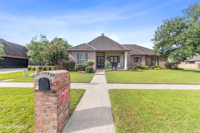 view of front of property with a front lawn