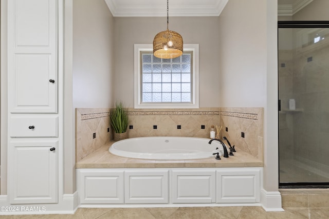 bathroom featuring tile patterned flooring, crown molding, and separate shower and tub