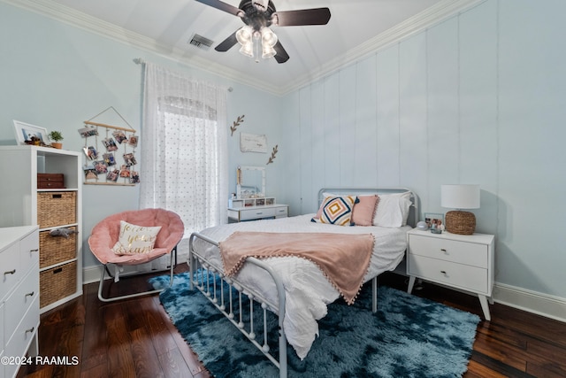 bedroom featuring crown molding, ceiling fan, and dark hardwood / wood-style flooring