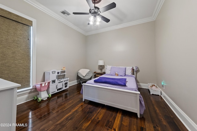 bedroom with crown molding, ceiling fan, and dark hardwood / wood-style flooring