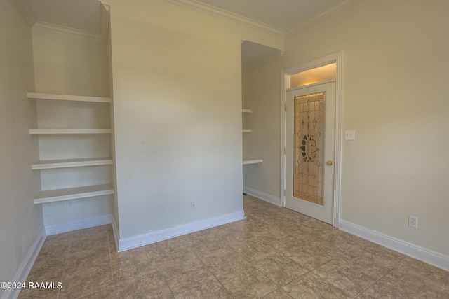 unfurnished bedroom with ornamental molding and tile patterned flooring