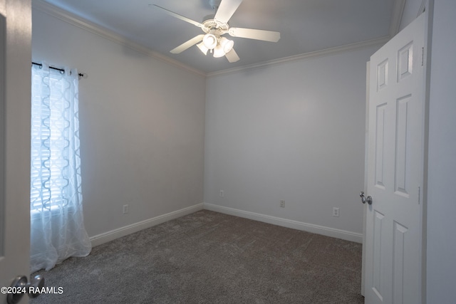 carpeted empty room with crown molding and ceiling fan