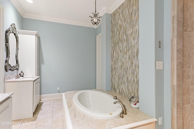 bathroom with tile patterned floors, a washtub, crown molding, and vanity