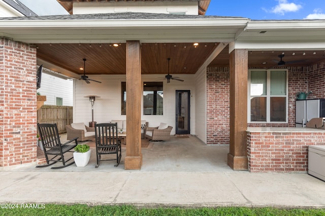 view of patio / terrace featuring an outdoor living space and ceiling fan