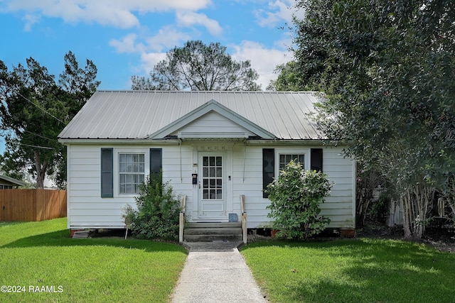 view of front of home with a front yard