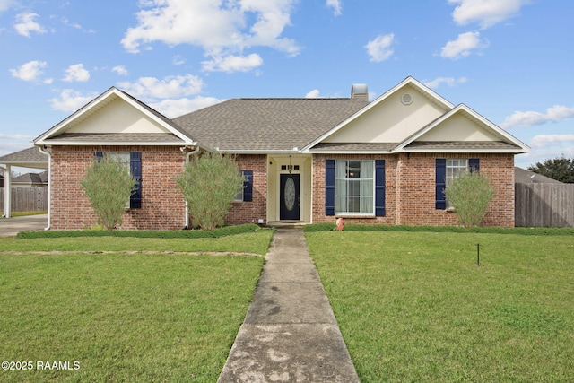 single story home with a front lawn