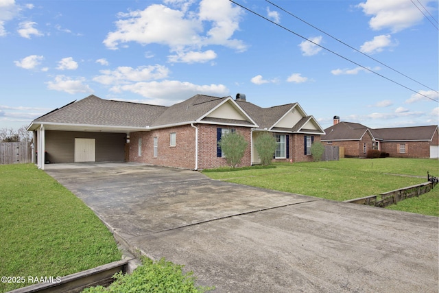 single story home with a front lawn and a carport