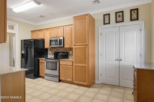 kitchen with crown molding, appliances with stainless steel finishes, light tile patterned flooring, and tasteful backsplash