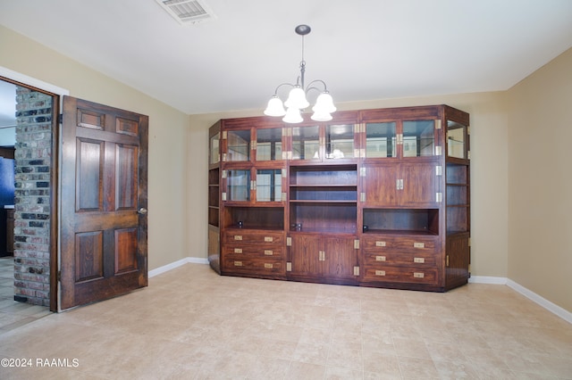 interior space with a notable chandelier