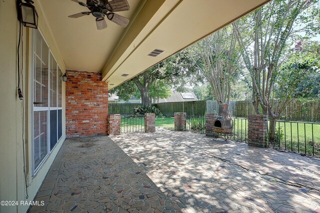 view of patio / terrace featuring ceiling fan