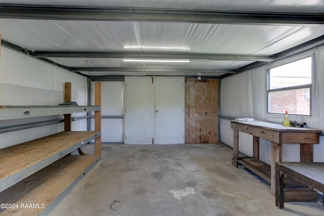 garage with a workshop area