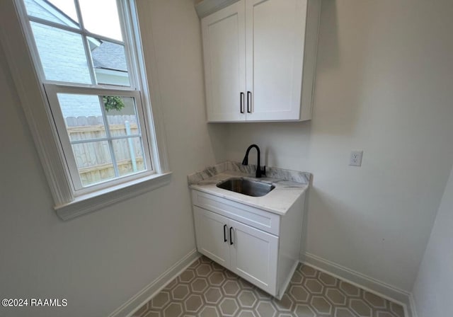 laundry area with sink