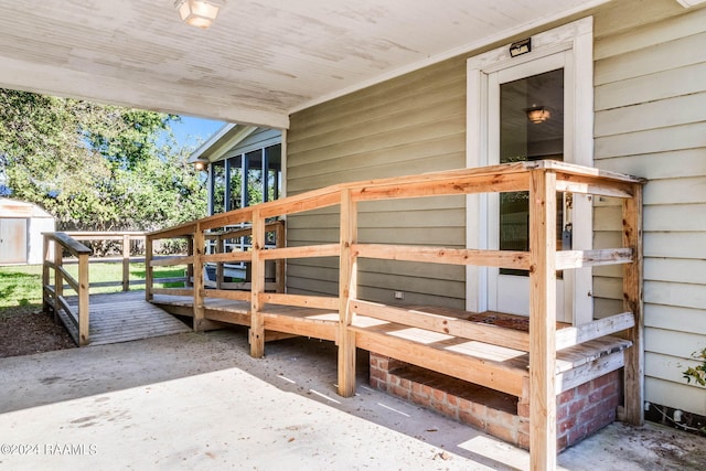 wooden deck with a shed