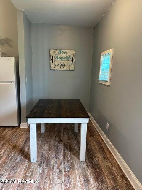 dining room featuring dark wood-type flooring