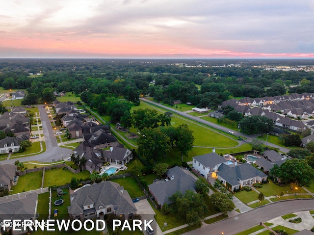 aerial view at dusk with a residential view