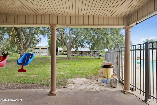 view of patio featuring a pool