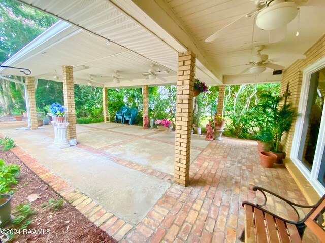 view of patio / terrace featuring ceiling fan