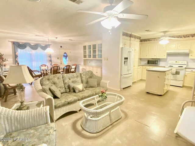 living room featuring ceiling fan