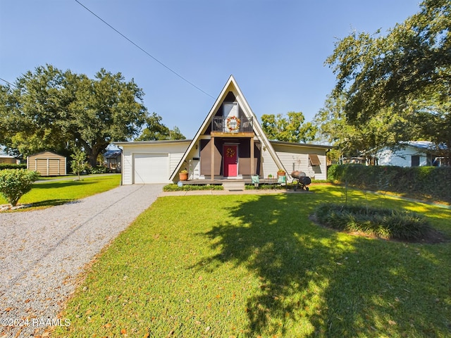 view of front facade with a front yard, a garage, and a storage unit