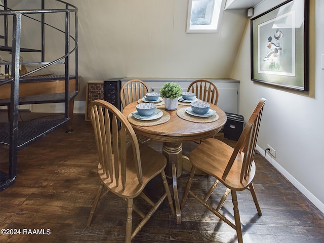 dining space with dark wood-type flooring