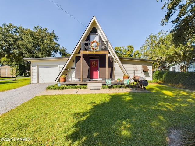 view of front of house featuring a front yard and a garage