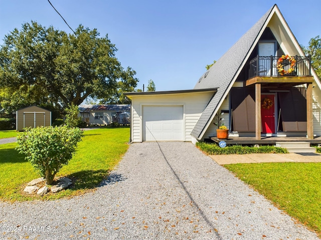 view of front of house featuring a front yard and a garage