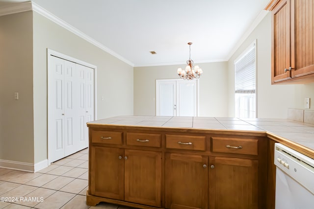 kitchen with light tile patterned floors, white dishwasher, crown molding, an inviting chandelier, and tile counters