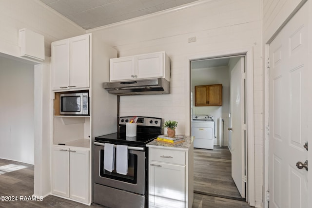 kitchen featuring dark wood-type flooring, under cabinet range hood, washer / clothes dryer, white cabinetry, and appliances with stainless steel finishes