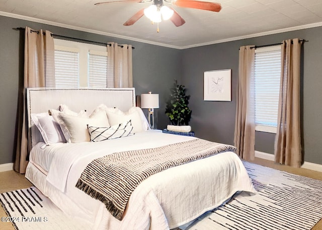 bedroom featuring ornamental molding, carpet, and ceiling fan