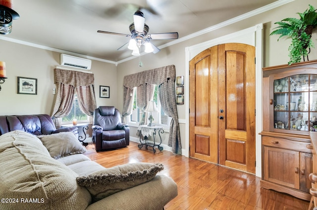 living room featuring a wall mounted AC, crown molding, hardwood / wood-style floors, and ceiling fan