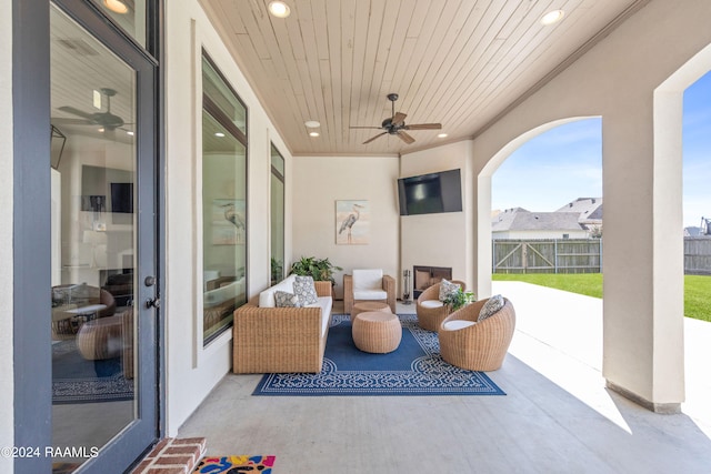 view of patio / terrace featuring an outdoor living space and ceiling fan