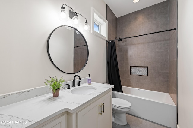 full bathroom with shower / bath combo, vanity, and toilet