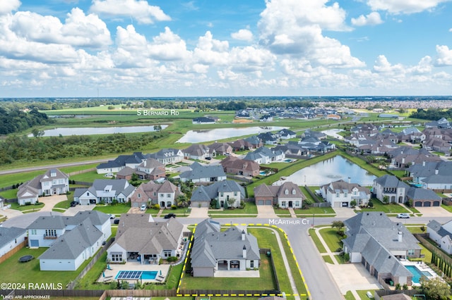 drone / aerial view featuring a water view