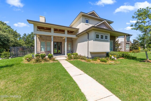 view of front of property with a front lawn