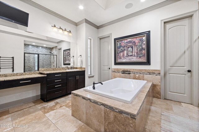 bathroom featuring crown molding, vanity, and separate shower and tub