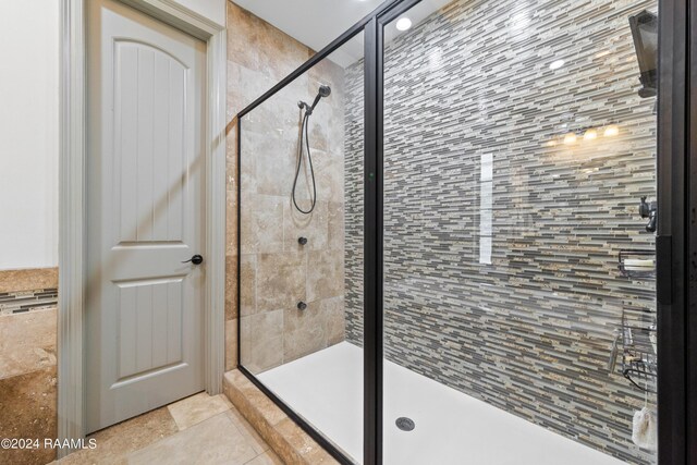 bathroom featuring an enclosed shower