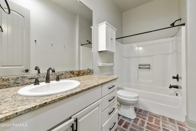 full bathroom with vanity, toilet, and washtub / shower combination