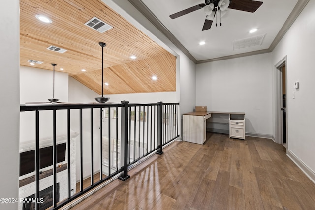 office space featuring crown molding, wooden ceiling, dark hardwood / wood-style flooring, lofted ceiling, and ceiling fan