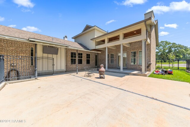 back of house featuring a patio