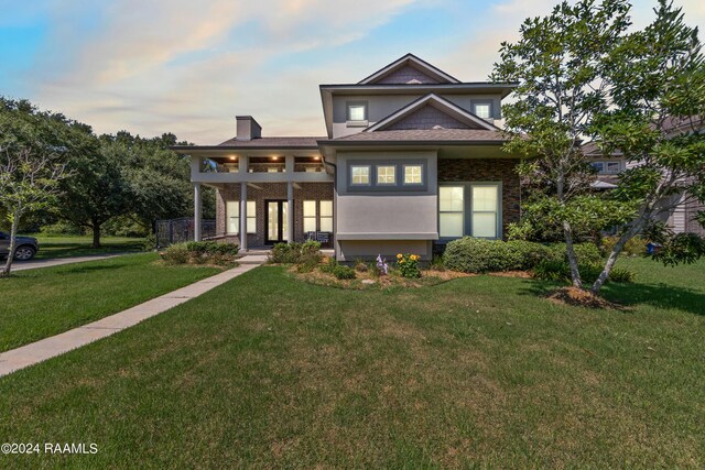 view of front of home with a front yard