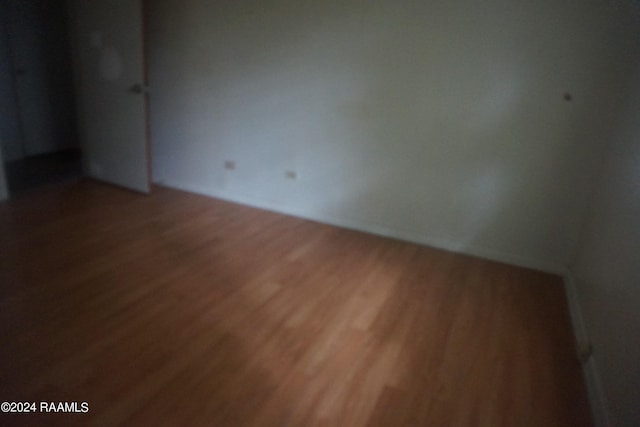 unfurnished room featuring wood finished floors